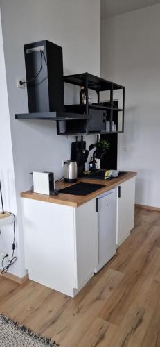 Charleroi Cozy Homeにあるキッチンまたは簡易キッチン