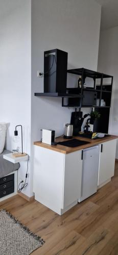 Charleroi Cozy Homeにあるキッチンまたは簡易キッチン
