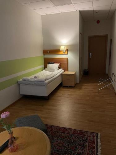 Cama o camas de una habitación en Trestads Värdshus