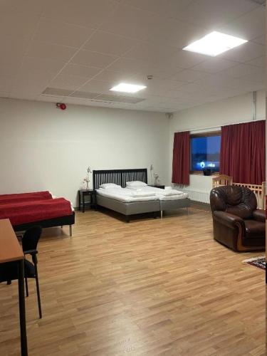 Cama o camas de una habitación en Trestads Värdshus