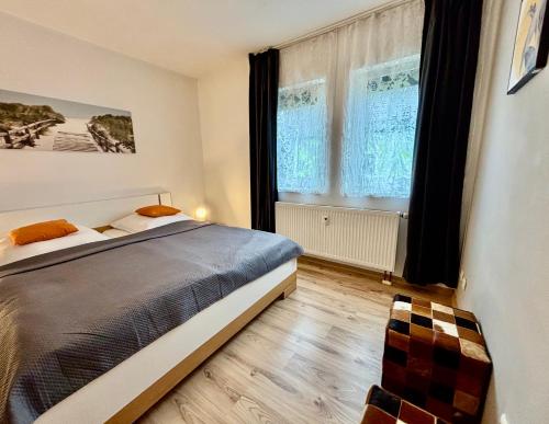 Postel nebo postele na pokoji v ubytování M&M Serviced Appartment