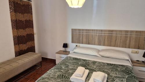 A bed or beds in a room at GABISOL Apartments 2