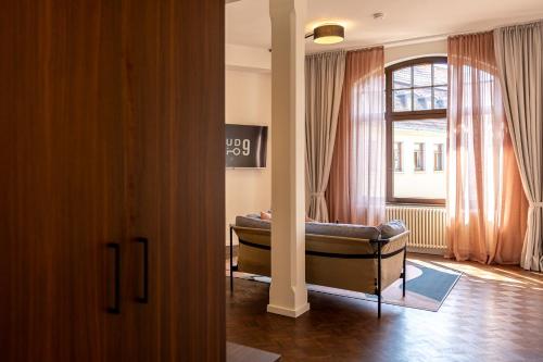 a bedroom with a bed in front of a window at Studio 9 in Fulda