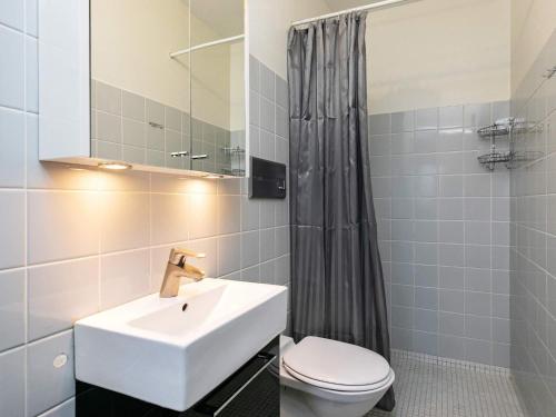 a bathroom with a sink and a toilet at 5 person holiday home on a holiday park in Lemvig in Lemvig