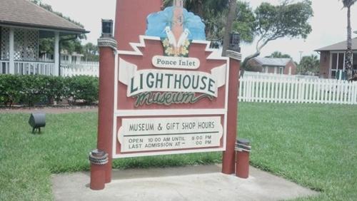 a sign for a golf courseokedichoice sign in a yard at Cozy Studio Suite Near Beach W Kitchenette #3 in Daytona Beach Shores