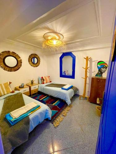 Postel nebo postele na pokoji v ubytování Surf & Salsa Ocean House