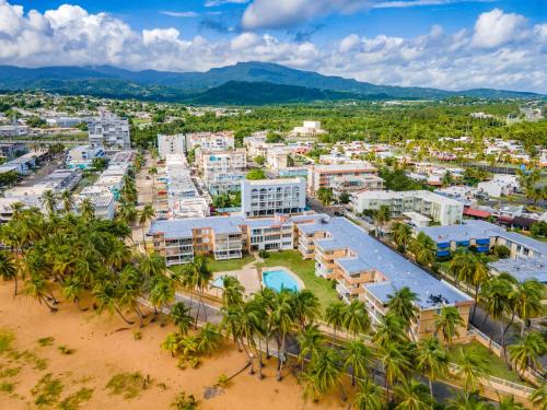an aerial view of a resort on the beach at Ocean Blue Beach Apt in Luquillo