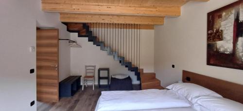 Postel nebo postele na pokoji v ubytování B&B Piccolo Relais