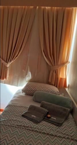 Billede fra billedgalleriet på Quarto e banheiro privativos na Barra i Rio de Janeiro