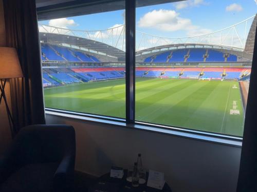 a view of a soccer stadium from a window at The Bolton Stadium Hotel, a member of Radisson Individuals in Bolton