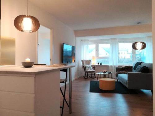 Posezení v ubytování Nordic style apartment in central Aalborg