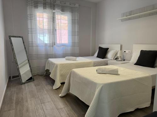 Posteľ alebo postele v izbe v ubytovaní Apartamento La Verdad
