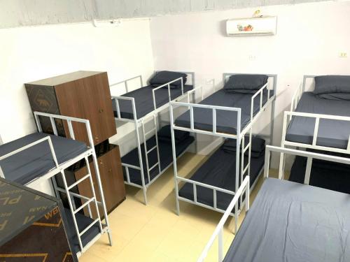 Una cama o camas en una habitación de Raina Tuan Chau