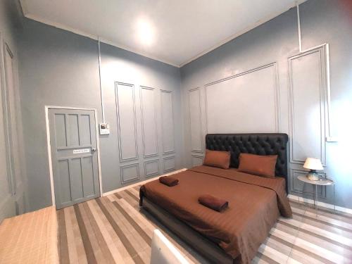 Ένα ή περισσότερα κρεβάτια σε δωμάτιο στο You Empire Hostel & Bar
