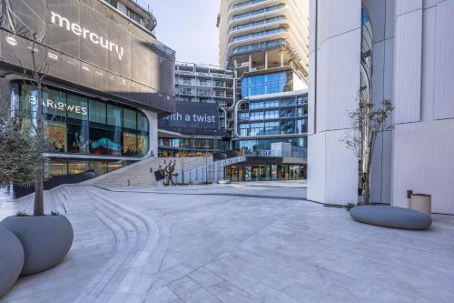 an empty street in a city with tall buildings at Vista Suites in Apartment in Mercury Towers in St Julian's