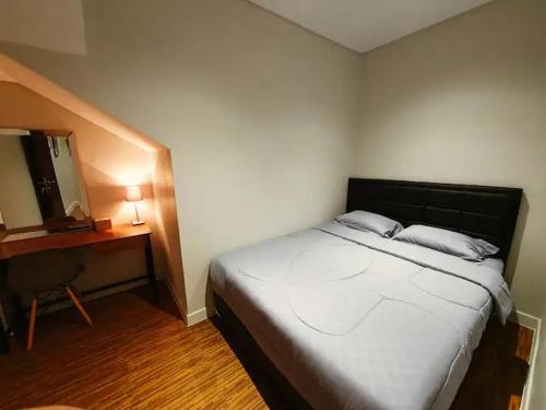 Кровать или кровати в номере Adenia Padma 3 Bedroom House