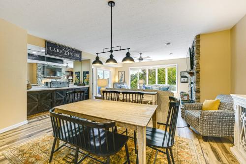 a kitchen and dining room with a table and chairs at Keowee Key Condo with Lake Access! in Salem