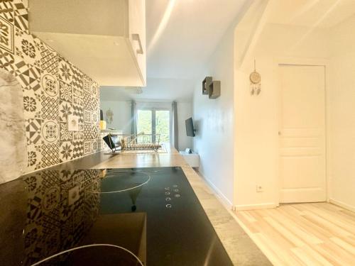 Kuchyň nebo kuchyňský kout v ubytování L'Oasis, lumineux et zen