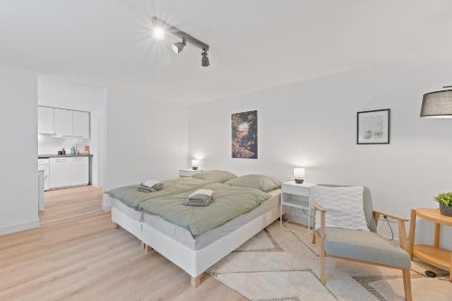 Postel nebo postele na pokoji v ubytování Wohlfühl-Apartment Weissach