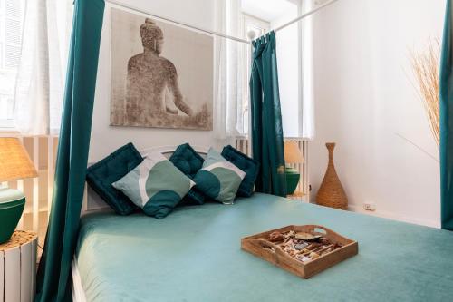 a bedroom with a bed with a wooden tray on it at Piazza di Spagna Historic Flat in Rome