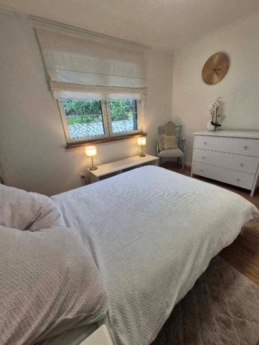 Postel nebo postele na pokoji v ubytování Siedlisko nad Drwęcą z jacuzzi i siłownią