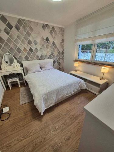 Postel nebo postele na pokoji v ubytování Siedlisko nad Drwęcą z jacuzzi i siłownią