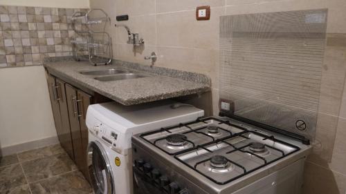 Dapur atau dapur kecil di Rawan apartments