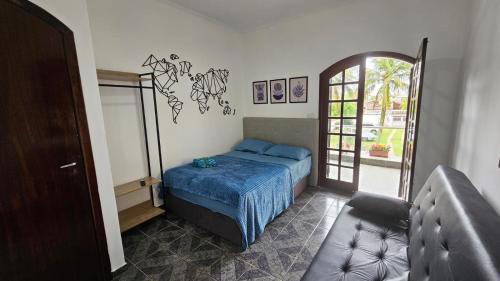 Postel nebo postele na pokoji v ubytování House Beach Brasil