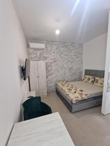 Postel nebo postele na pokoji v ubytování Apartman Kruna