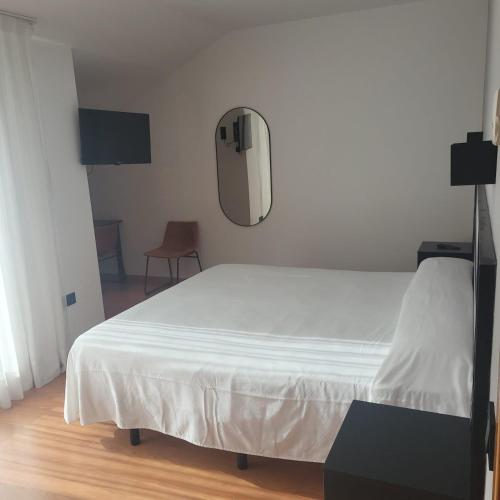 Cama o camas de una habitación en Hotel Torcal