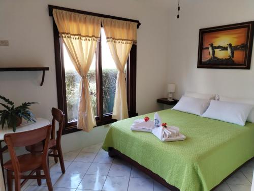 Postel nebo postele na pokoji v ubytování Hotel StarFish