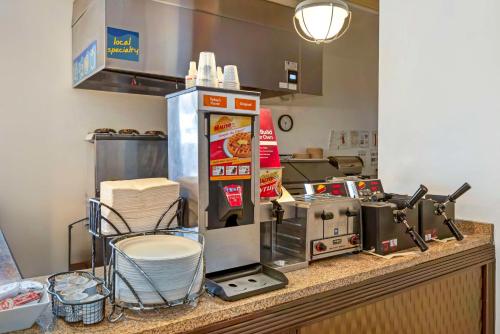 a kitchen with a counter with a food appliance at Best Western Plus Eagleridge Inn & Suites in Pueblo