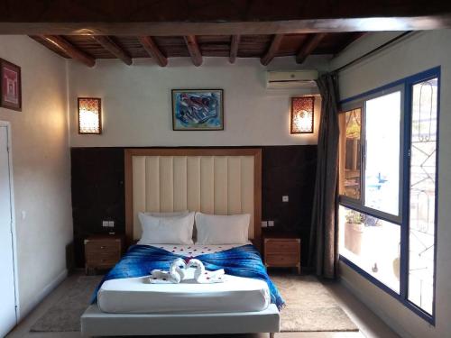 Postel nebo postele na pokoji v ubytování Auberge kasbah tifirte