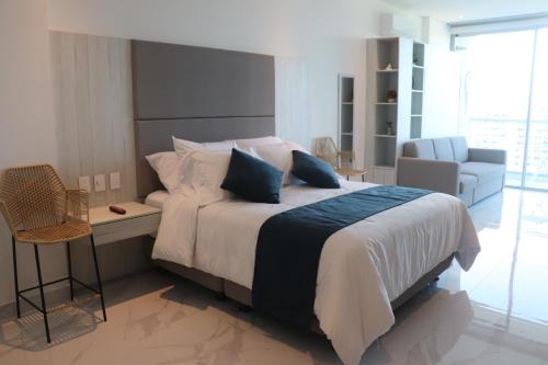 Postel nebo postele na pokoji v ubytování Sui Loft santa marta