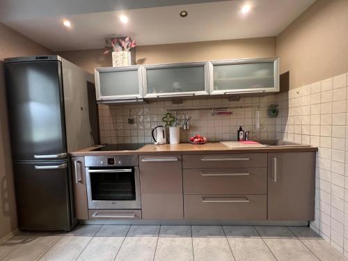 Η κουζίνα ή μικρή κουζίνα στο Visit Sigulda apartment self check-in