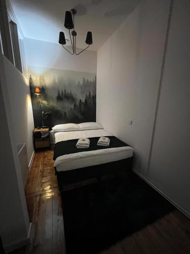 Łóżko lub łóżka w pokoju w obiekcie Apartamenty Łuczkowskiego z widokiem na Studnię 3