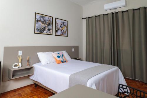 Ένα ή περισσότερα κρεβάτια σε δωμάτιο στο Smart Hotel