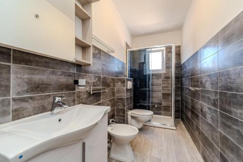 Kúpeľňa v ubytovaní Apartments Mlado