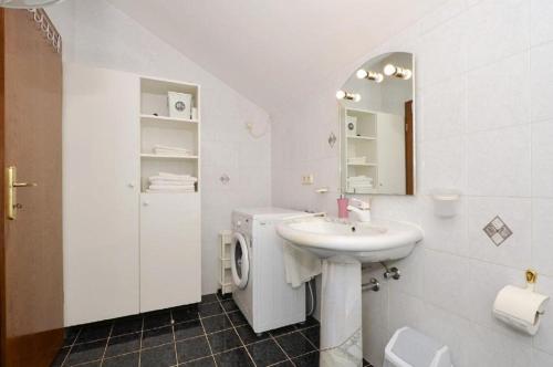 Kúpeľňa v ubytovaní Apartment Bozo