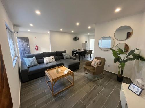 Coin salon dans l'établissement Ocean view by Charmes A