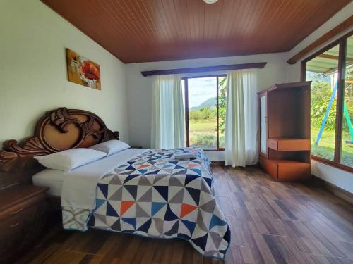 Postel nebo postele na pokoji v ubytování La Quinta de Andrés