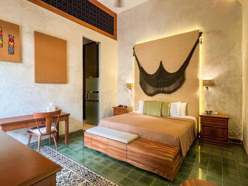 Postel nebo postele na pokoji v ubytování Ya'ax Hotel Boutique