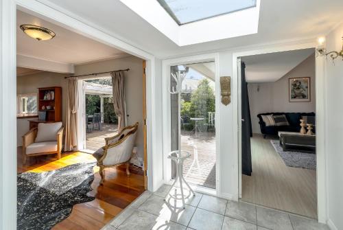 an open living room with a skylight at Bronte House in Martinborough 