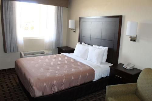 Ένα ή περισσότερα κρεβάτια σε δωμάτιο στο Quality Inn Conway - Greenbrier