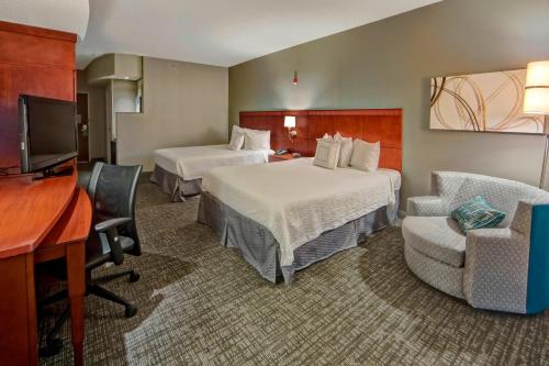 Courtyard by Marriott Memphis Southavenにあるテレビまたはエンターテインメントセンター
