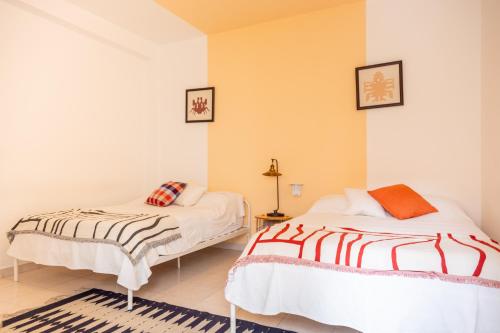 Katil atau katil-katil dalam bilik di Gran casa para amigos a 4 cuadras del Zocalo