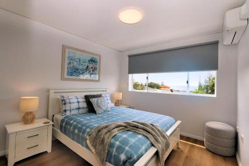 Postel nebo postele na pokoji v ubytování Platinum Apartments Unit 7