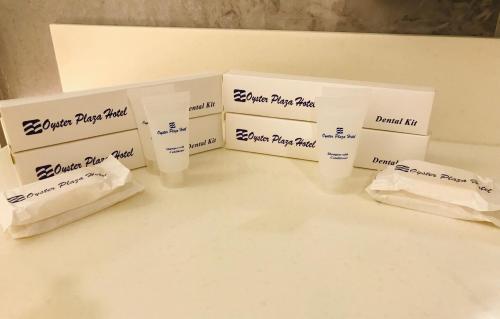 a counter with three boxes of toilet paper on it at Oyster Plaza Hotel in Manila