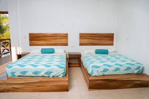 Postel nebo postele na pokoji v ubytování Playa Monterrico Candelaria3