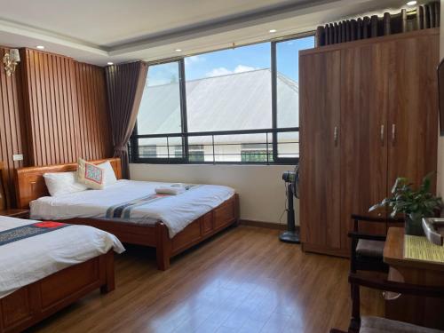 Katil atau katil-katil dalam bilik di TuongMai Home & Trekking Tour